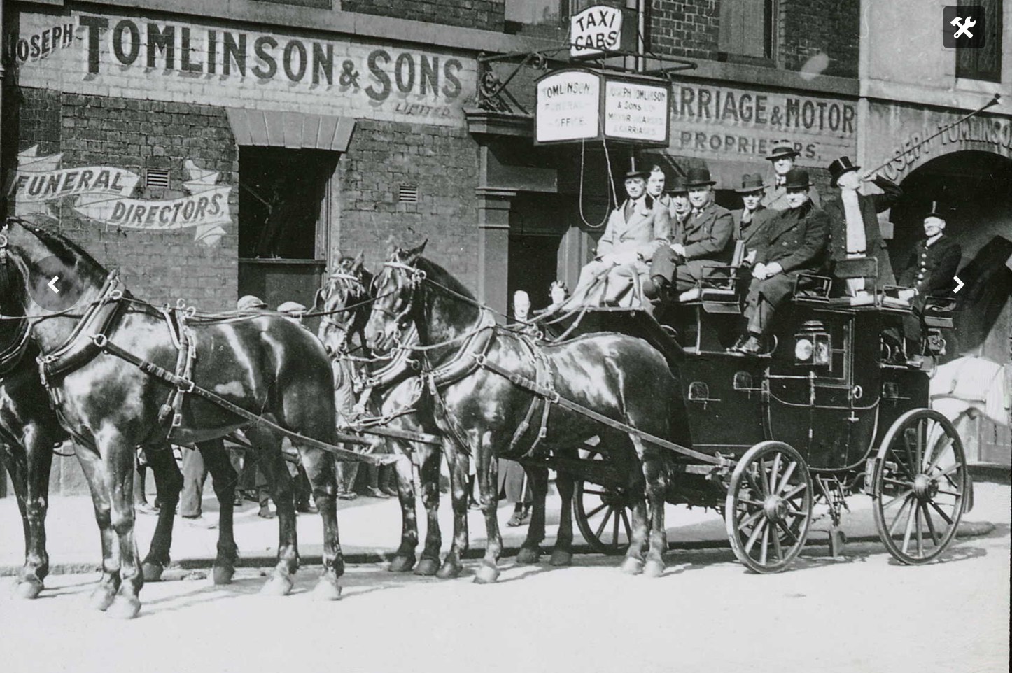 Coach and Four outside Borough Mews owned by Joseph Tomlinson & Sons Ltd